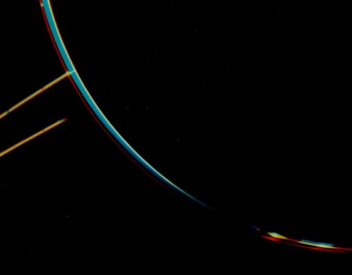Colorful Jupiter's Rings
Caption NASA originale:"Jupiter's faint ring system is shown in this color composite as two light orange lines protruding from the left toward Jupiter's limb. This picture was taken in Jupiter's shadow through orange and violet filters. The colorful images of Jupiter's bright limb are evidence of the spacecraft motion during these long exposures. The Voyager 2 spacecraft was at a range of 1.450.000 kilometers about two degrees below the plane of the ring. The lower ring image was cut short by Jupiter's shadow on the ring itself".
Parole chiave: Jupiter's Rings