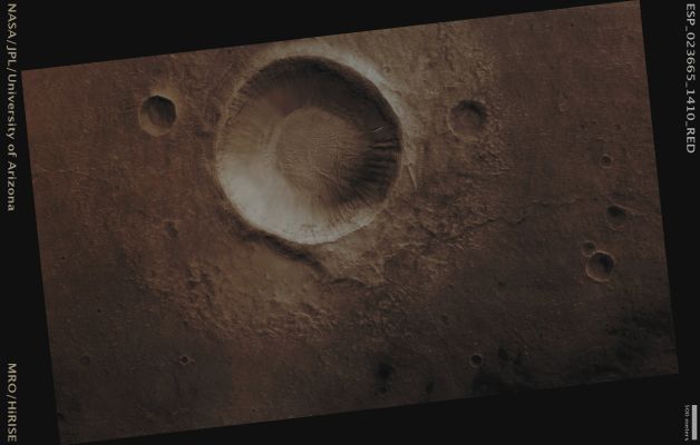 Unnamed Southern Crater with Gullies (CTX Frame - Absolute Natural Colors; credits for the additional process. and color.: Dr Paolo C. Fienga - Lunexit Team)
Mars Local Time: 14:15 (Early Afternoon)
Coord. (centered): 38,5° South Lat. and 194,5° East Long.
Spacecraft altitude: 255,0 Km (such as about 159,4 miles) 
Original image scale range: 51,0 cm/pixel (with 2 x 2 binning) so objects ~ 1 mt and 53 cm across are resolved 
Map projected scale: 50 cm/pixel
Map projection: EQUIRECTANGULAR
Emission Angle: 6,9° 
Sun-Mars-Spacecraft (or "Phase") Angle: 49,6°
Solar Incidence Angle: 44° (meaning that the Sun is about 46° above the Local Horizon)
Solar Longitude: 344,6° (Northern Winter)
Credits: NASA/JPL/University of Arizona
Additional process. and coloring: Dr Paolo C. Fienga - Lunar Explorer Italia
Parole chiave: Mars from orbit - Craters - Unnamed Crater with Gullies