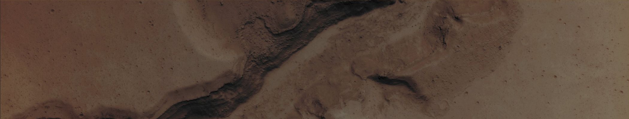 Features of Kasei Valles (Natural Colors; credits for the additional process. and color.: Dr Paolo C. Fienga - Lunexit Team)  
Mars Local Time: 14:16 (Early Afternoon)
Coord. (centered): 20,8° North Lat. and 287,4° East Long.
Spacecraft altitude: 283,0 Km (such as about 176,9 miles) 
Original image scale range: 28,3 cm/pixel (with 1 x 1 binning) so objects ~ 85 cm across are resolved 
Map projected scale: 25 cm/pixel
Map projection: EQUIRECTANGULAR
Emission Angle: 3,3° 
Sun-Mars-Spacecraft (or "Phase") Angle: 35,0°
Solar Incidence Angle: 38° (meaning that the Sun is about 52° above the Local Horizon)
Solar Longitude: 5,8° (Northern Spring)
Credits: NASA/JPL/University of Arizona
Additional process. and coloring: Dr Paolo C. Fienga - Lunar Explorer Italia
Parole chiave: Mars from orbit - Channels - Kasei Valles Channel System