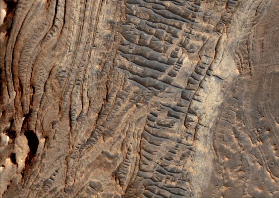 Features of West Candor Chasma (EDM - Absolute Natural Colors; credits for the additional process. and color.: Dr Paolo C. Fienga - Lunexit Team)
Mars Local Time: 15:13 (early afternoon)
Coord. (centered): 6,733° South Lat. and 284,485° East Long.
Spacecraft altitude: 266,6 Km (such as about 166,6 miles) 
Original image scale range: 26,7 cm/pixel (with 1 x 1 binning) so objects ~ 80 cm across are resolved (with 4 x 4 binning)
Map projected scale: 25 cm/pixel
Map projection: EQUIRECTANGULAR
Emission Angle: 9,8° 
Sun - Mars - MRO (or "Phase") Angle: 50,0°
Solar Incidence Angle: 57° (meaning that the Sun is about 33° above the Local Horizon)
Solar Longitude: 82,4° (Northern Spring)
Credits: NASA/JPL/University of Arizona
Additional process. and coloring: Lunar Explorer Italia
Parole chiave: Mars from orbit - Chasmas - Candor Chasma