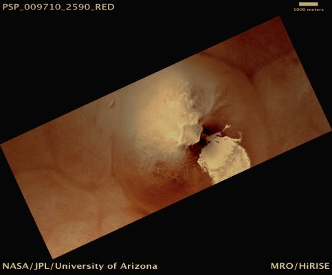 Relatively Fresh Ice-Patch near the North Polar Layered Deposits (possible True Colors; credits: Lunar Explorer Italia)
Mars Local Time: 14:57 (early afternoon)
Coord. (centered): 78,7° North Lat. and 285,2° East Long.
Spacecraft altitude: 323,6 Km (such as about 202,2 miles) 
Original image scale range: 32,4 cm/pixel (with 1 x 1 binning) so objects ~97 cm across are resolved 
Map projected scale: 25 cm/pixel 
Map projection: EQUIRECTANGULAR 
Emission Angle: 11,8° 
Phase Angle: 50,0°
Solar Incidence Angle: 60° (meaning that the Sun is about 30° above the Local Horizon)
Solar Longitude: 116,1° (Northern Summer)
Credits: NASA/JPL/University of Arizona
Additional process. and coloring: Lunar Explorer Italia
Parole chiave: Mars from orbit - Ice-Patch near the NPLD